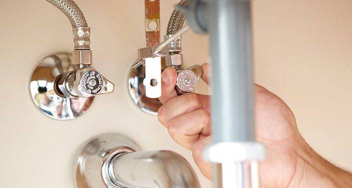 Installation of a Faucet In The Bathroom